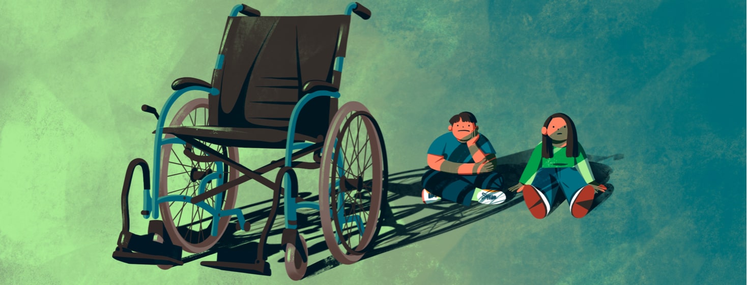 alt=two siblings sit sadly in the shadow of a wheelchair