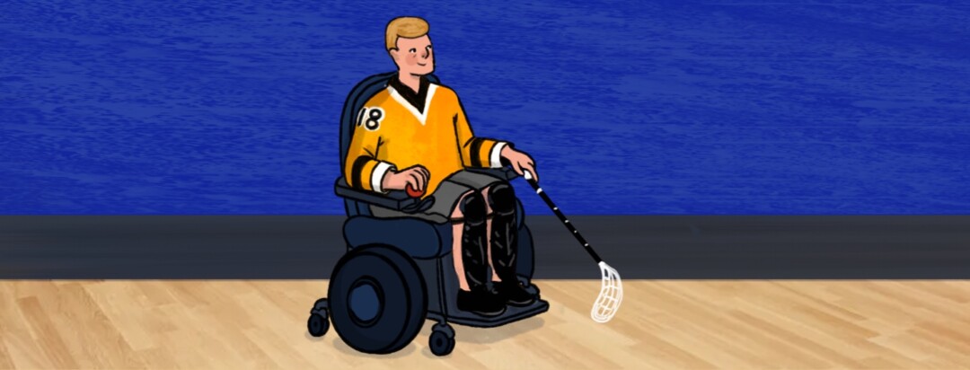 A man in a motorized wheelchair is moving across a wooden gym floor with a hockey stick in his hand.